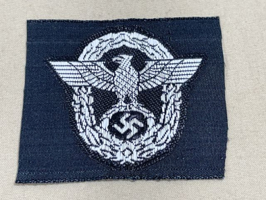 Original WWII German Panzer Police M43/Overseas Cap Insignia